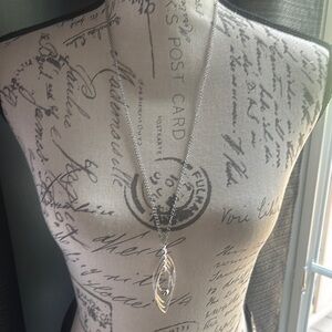 Silver Necklace with Intricate Detailing